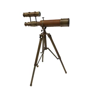 May include: A brass telescope with a brown leather barrel mounted on a brass tripod.