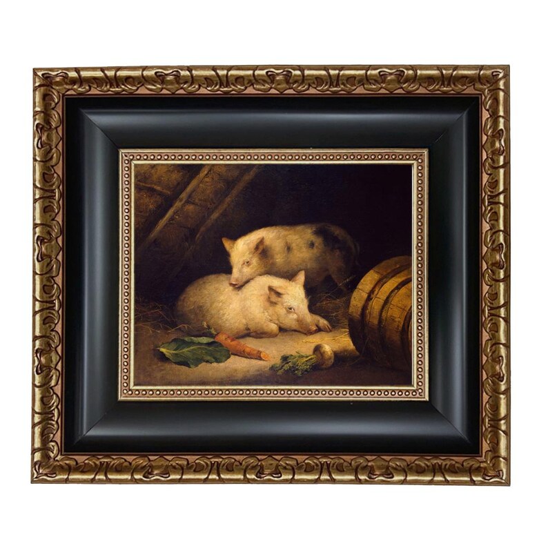 May include: Framed oil painting depicting two pigs in a barn setting. The pigs are light-colored with dark spots, resting near a carrot, turnip, and a wooden barrel. The frame is black with a gold ornate border.