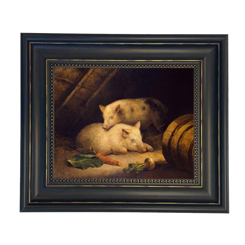 May include: Framed painting of two pigs resting in a barn. The pigs are light-colored with dark spots. A carrot, a turnip, and a green leaf are in the foreground. A wooden barrel is visible on the right side. The frame is black with a gold beaded inner edge.