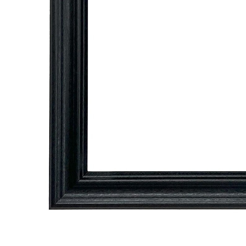 May include: Black picture frame with a simple, slightly raised, beveled edge.