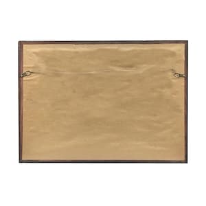 May include: The back of a framed picture with a brown mat and a dark wood frame. The frame has two brass hanging hooks on the top.