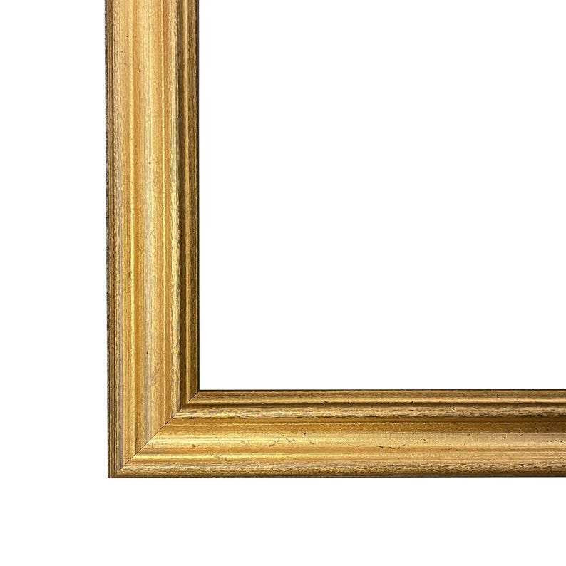 May include: A gold picture frame with a simple, classic design. The frame has a slightly distressed finish, giving it a vintage look.