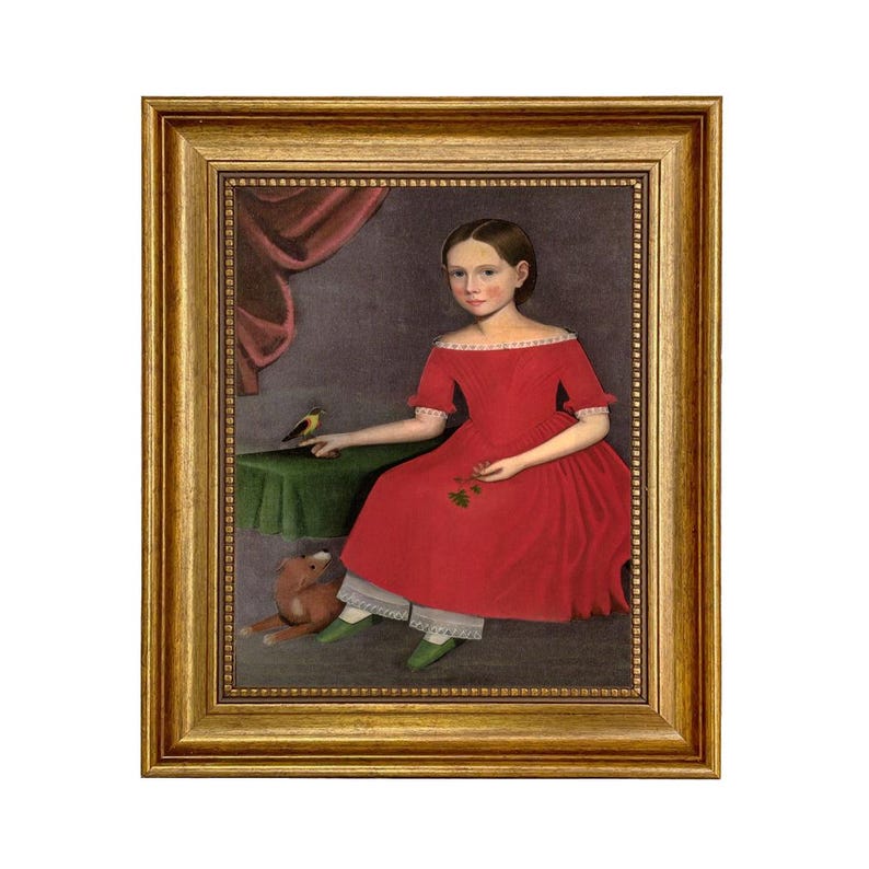 May include: A framed portrait of a young person in a red dress, seated with a small table and a toy bear. A bird perches on the table. The painting has a gold frame and a vintage aesthetic.