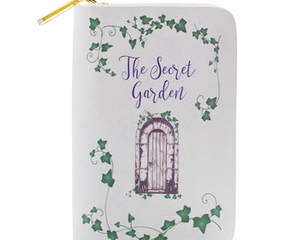 May include: White zippered wallet with a green ivy design and the text "The Secret Garden" in purple lettering. The wallet also features a drawing of a closed door with an arched top. The text "Frances Hodgson Burnett" is printed at the bottom of the wallet.