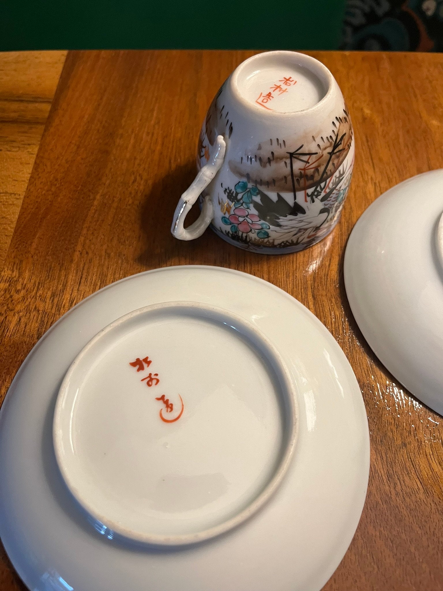 1920's Meiji Kutani Eggshell Porcelain Tea Cup and 2 Saucers Depicting