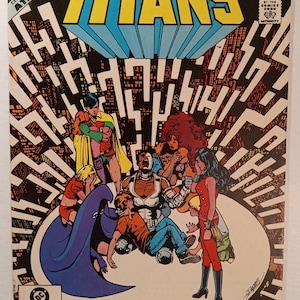 The New Teen Titans #27 : Bronze Age Comics / Grade Range - 7.5 to 8.0 / 1st App. Atari Force