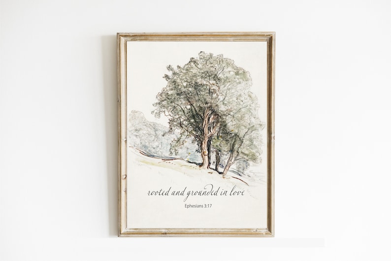 Może przedstawiać: Wydruk w ramie z akwarelą przedstawiającą drzewo w leśnym otoczeniu. Wydruk zawiera tekst "rooted and grounded in love" i "Ephesians 3:17" pod obrazem.