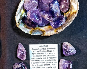 May include: Amethyst crystals in a shell with a description of the stone's properties. Amethyst is said to be a stone of spiritual protection and purification, helps to fight addiction, aids in meditation, and can clear one's energy field of negative influences and attachments.