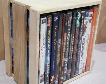 Dvd storage crate holds 12 normal sized dvd cases.