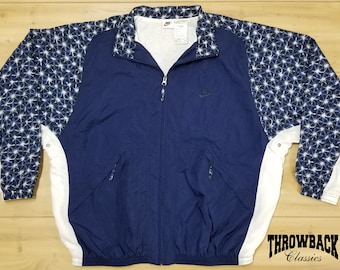 Vintage Nike 90s Windbreaker Jacket Zip Retro Swoosh Blue White Rare Stars Pattern - Womens Size Extra Large or Mens Undersized XL/L