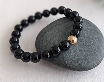 Black Onyx beaded bracelet with a 14k gold filled focal bead, Natural gemstone jewelry for her, handmade in Canada