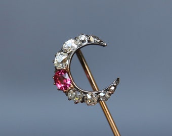 Antique crescent moon pin with diamonds (0.3ct) and spinel in 14ct gold