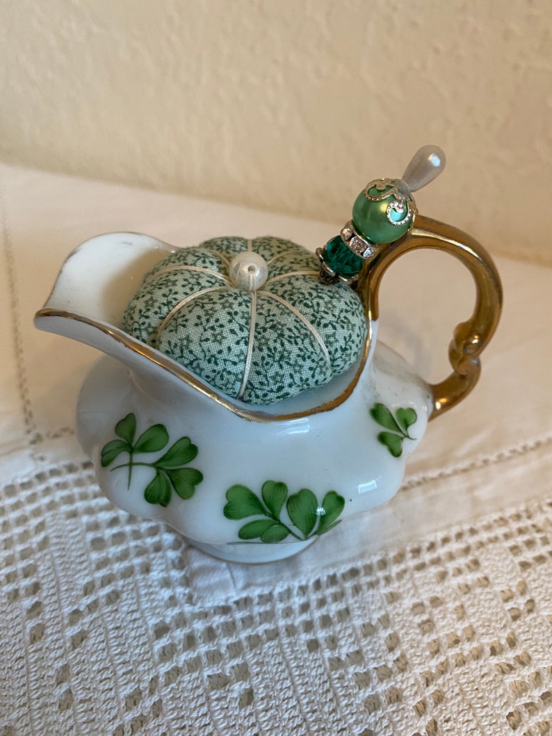 Teapot pincushion with green clovers and coordinating print