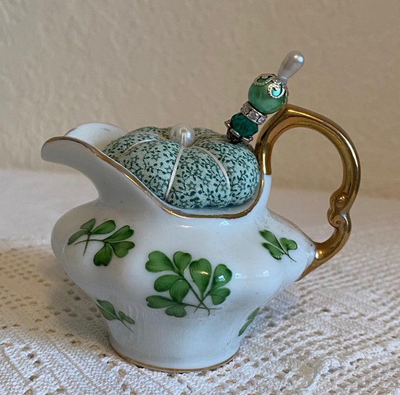Teapot pincushion with green clovers and coordinating print