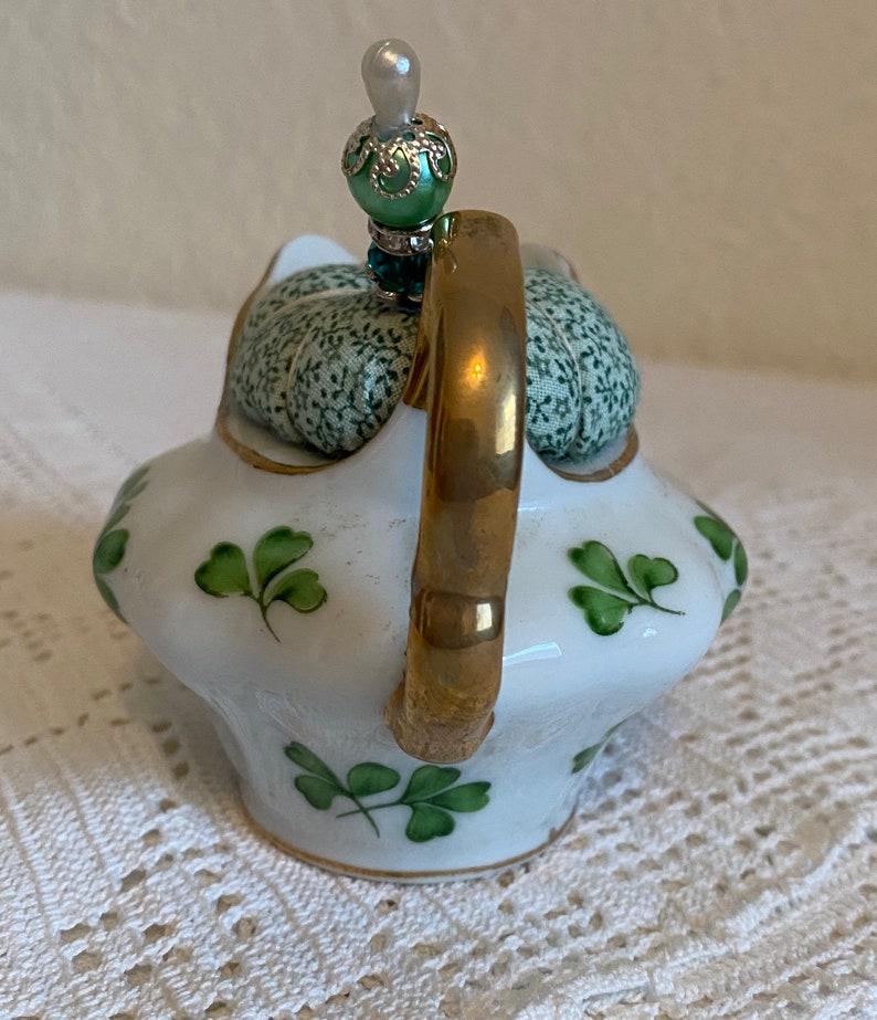 Teapot pincushion with green clovers and coordinating print