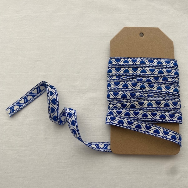 Embroidered blue and white heart trim/ribbon.  Vintage Blue and white jacquard trim . 3 yards continuous cut.