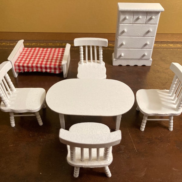 Vintage Set Of White Painted Wooden Minature Dolls House Furniture. Including a Table, 4 Chairs, Chest Of Drawers and a Red Chequered Bed
