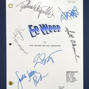 May include: A white script page for "Ed Wood" with multiple signatures in blue and black ink. The title is in blue 3D lettering. Includes the names of the writers, and the script number. The page has two brass eyelets.