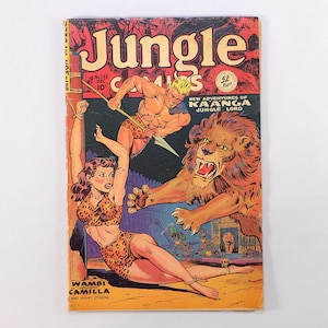 May include: A vintage Jungle Comics No. 132 issue from December featuring a blonde man with a spear, a woman in a leopard print outfit tied to a post, and a roaring lion. The cover includes the text Jungle Comics, Kaanga Jungle Lord, and Wambi Camilla.