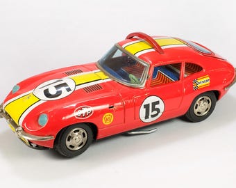 Auto giocattolo Jaguar ribaltabile in latta, a batteria, anni '60 – Giocattoli moderni, Giappone