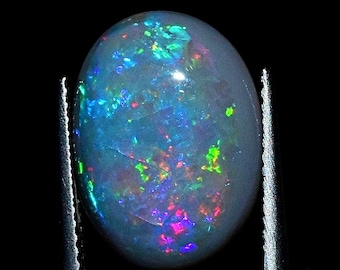 Australian Black Opal, 4.75 ct Rainbow Oval Cabochon
