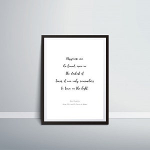 May include: Black and white typography print with a quote about happiness. The quote reads "Happiness can be found, even in the darkest of times, if one only remembers to turn on the light." The quote is attributed to Alice Oswald, from her book "Once I Was a Bee."