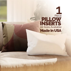 May include: A white pillow insert on a brown couch with other pillows. The text on the image reads "1 Piece Pillow Inserts All Sizes Available Made in USA".
