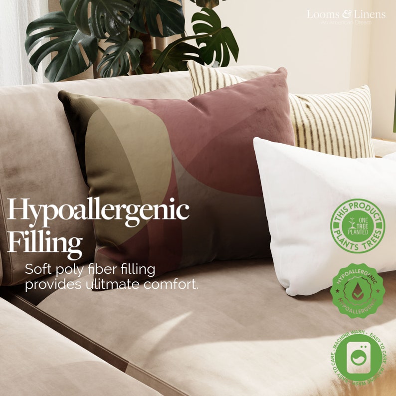 May include: A close-up of a couch with two throw pillows. The pillows are made of a soft, plush fabric and have a geometric pattern. The text "Hypoallergenic Filling" is visible in the image. The text "Soft poly fiber filling provides ultimate comfort." is also visible in the image. The image also includes a green eco-friendly label that says "This product plants trees."