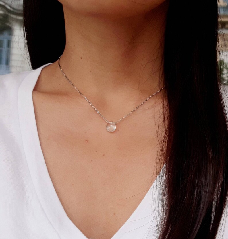 Flat drop rock crystal collar with facets very fine chain.