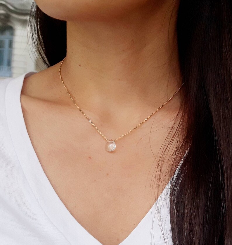 Flat drop rock crystal collar with facets very fine chain.