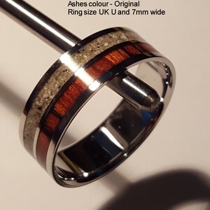 May include: A silver ring with a red and white inlay. The ring is 7mm wide and is size UK U. Img 15g Ashes colour - Original