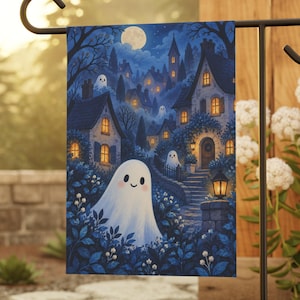 May include: A rectangular garden flag featuring a whimsical illustration of a night scene with a full moon, a small village of houses with glowing windows, and several white ghosts floating among dark blue foliage and stone pathways.
