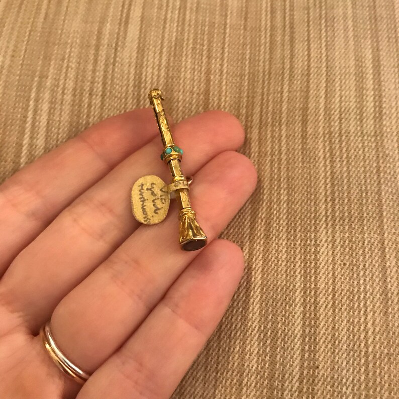 Antique Victorian 9ct Gold Retractable Pencil with seven turquoise stones and smokey quartz end.