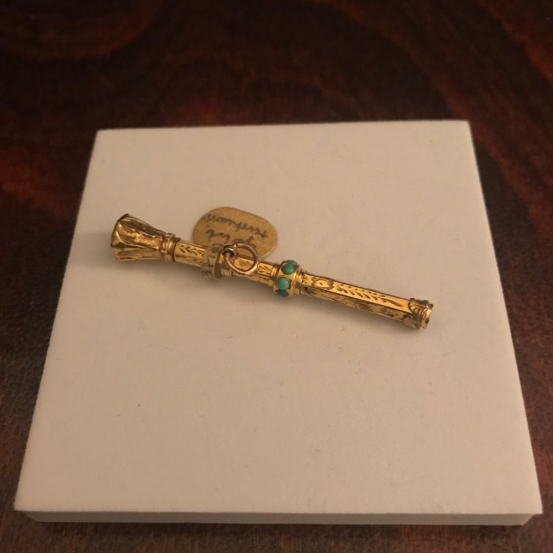 Antique Victorian 9ct Gold Retractable Pencil with seven turquoise stones and smokey quartz end.