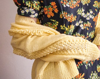 hand knitted open weave sweater cardigan handmade from yolk acrylic yarn, v-neck, long sleeves, button closure open knit day cardigan