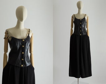 1980s 1990s Pellessimo Paris magnificent very soft black leather bustier top woven leather gold tone chain shoulder strap, dome snap button