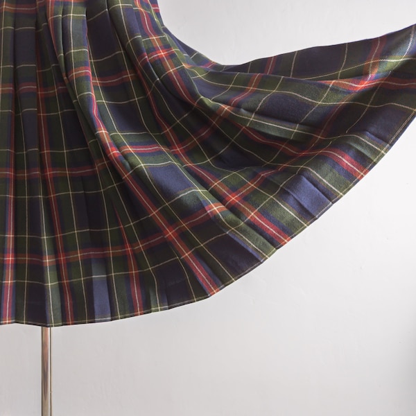 Scotland tartan pleated skirt by Kinloch Anderson wool tweed skirt with pleats, green, blue, red and white tartan designs
