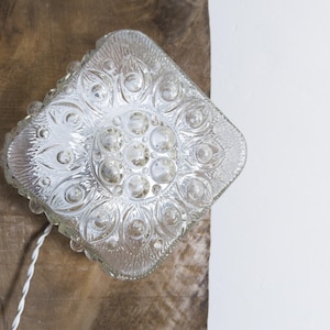bubble glass wall lamp/flush mount ceiling light - solid glass shade/metal - long cord, plug, and switch. unknown origin.