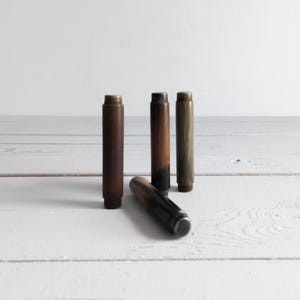 245 grams antique german bakelite rod 4 doorknobs