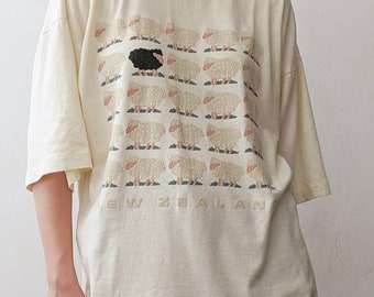 black sheep t-shirt vintage 1990s graphic tee New Zealand spell out, signed ©&#39;91 C.D., creamy cotton, single stitch, ribbed crew neck