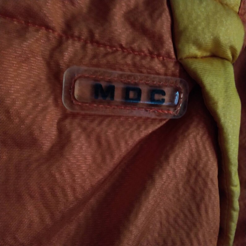 used orange ski jacket womens|snowboard jacket|mustard