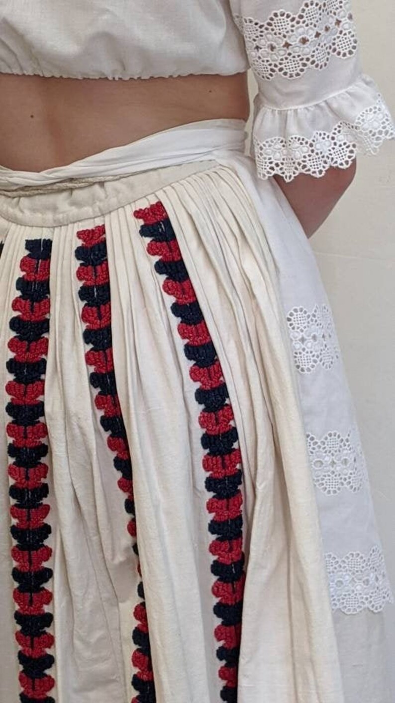 antique vintage hand embroidered boucle stitches folk skirt with scalloped crochet lace edging hem