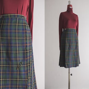 austrian tartan kilt with pin plaid pleated skirt acrylic tweed skirt with pleats. navy green red yellow tartan designs. imperfect condition