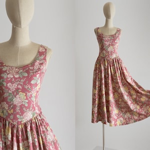 1980s-1990s Laura Ashley Tea Dress in blooms of English garden roses, floral patterned cotton, flared skirt, princess neckline, sleeveless