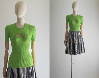 French lame rib knit top vintage 1970s Frank Michel silver shiny spring grass green short sleeve tight sweater tee flower embroidered yoke