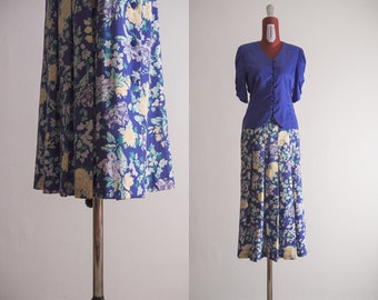 1980s Laura Ashley skirt side button flared pleated midi floral blooming patterned cotton deep periwinkle blue flower power us 8 10 uk 12 14