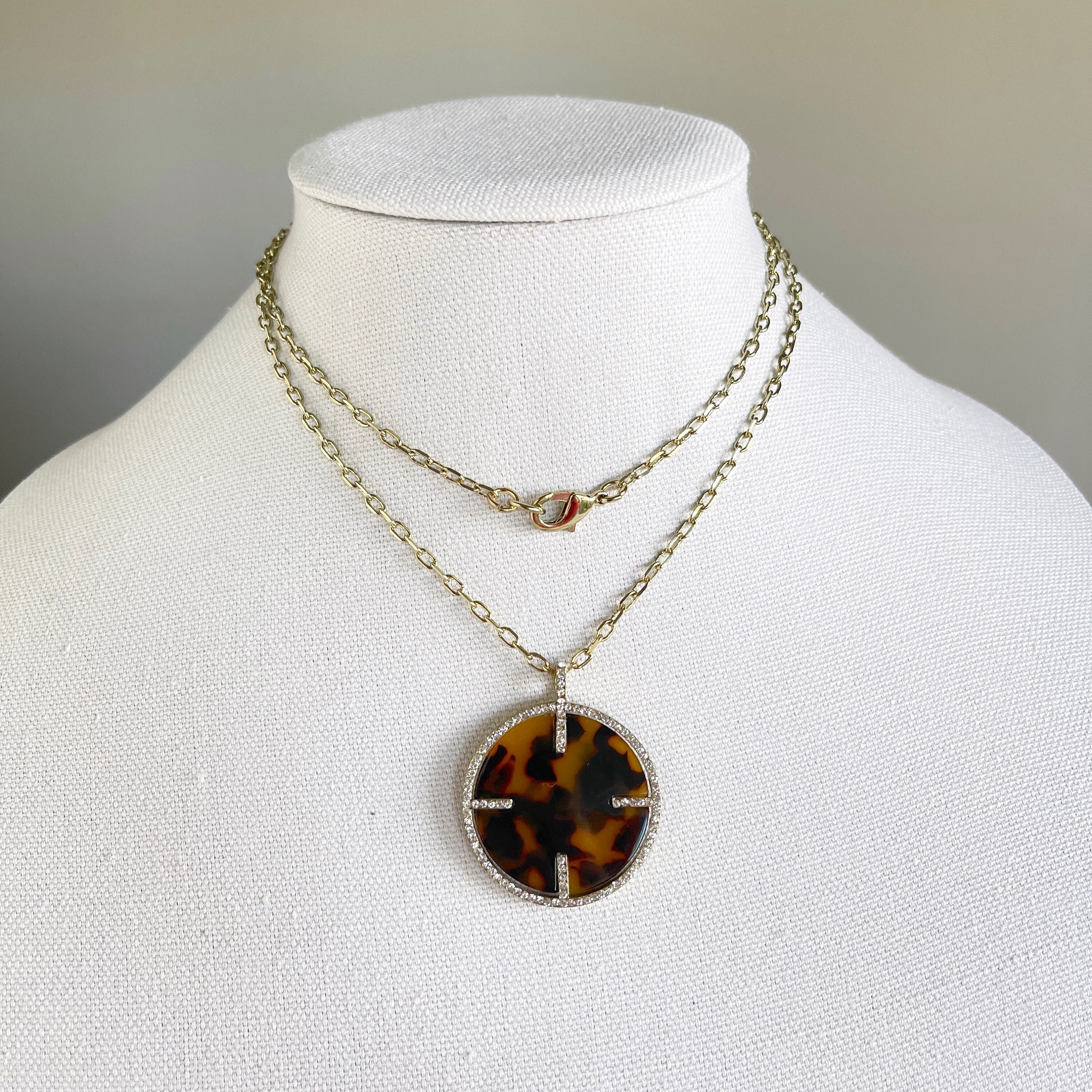 Tortoise shell pendant best sale necklace