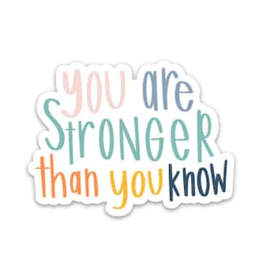 May include: A sticker with the text "You are stronger than you know" in a colorful, handwritten font. The words are in different colors, including pink, blue, green, orange, and yellow.
