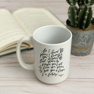 May include: White ceramic mug with a black inspirational quote from Jeremiah 29:11. The quote reads "for I know the plans I have for you, declares the Lord, "plans to prosper you and not to harm you, plans to give you hope and a future."