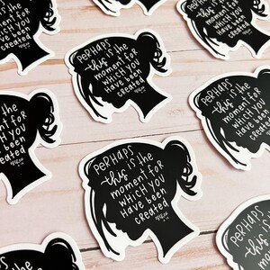 May include: Black and white silhouette sticker with the text "PERHAPS this is the moment for WHICH YOU Have been Created" repeated multiple times.